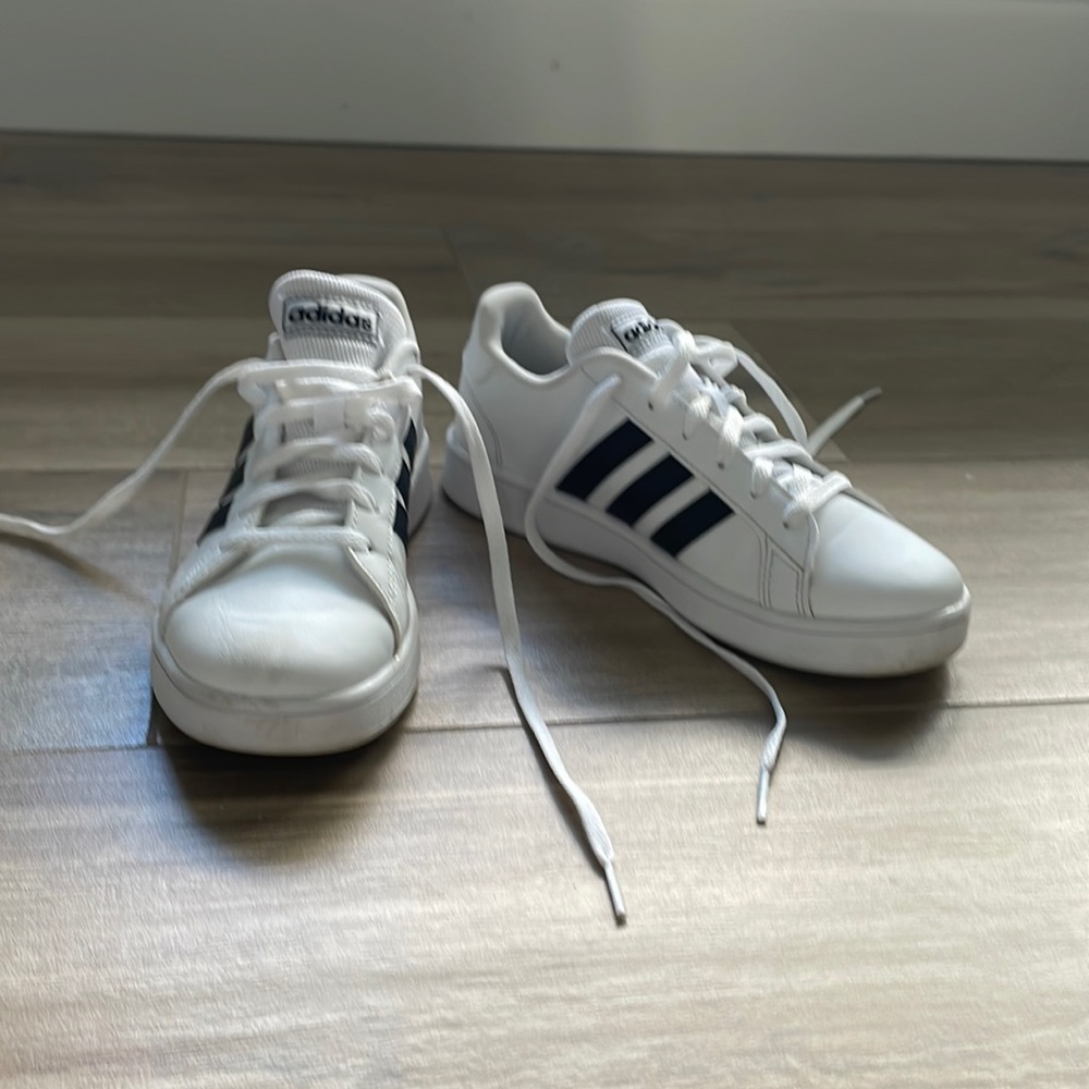 Boys slightly worn Adidas Sneakers.